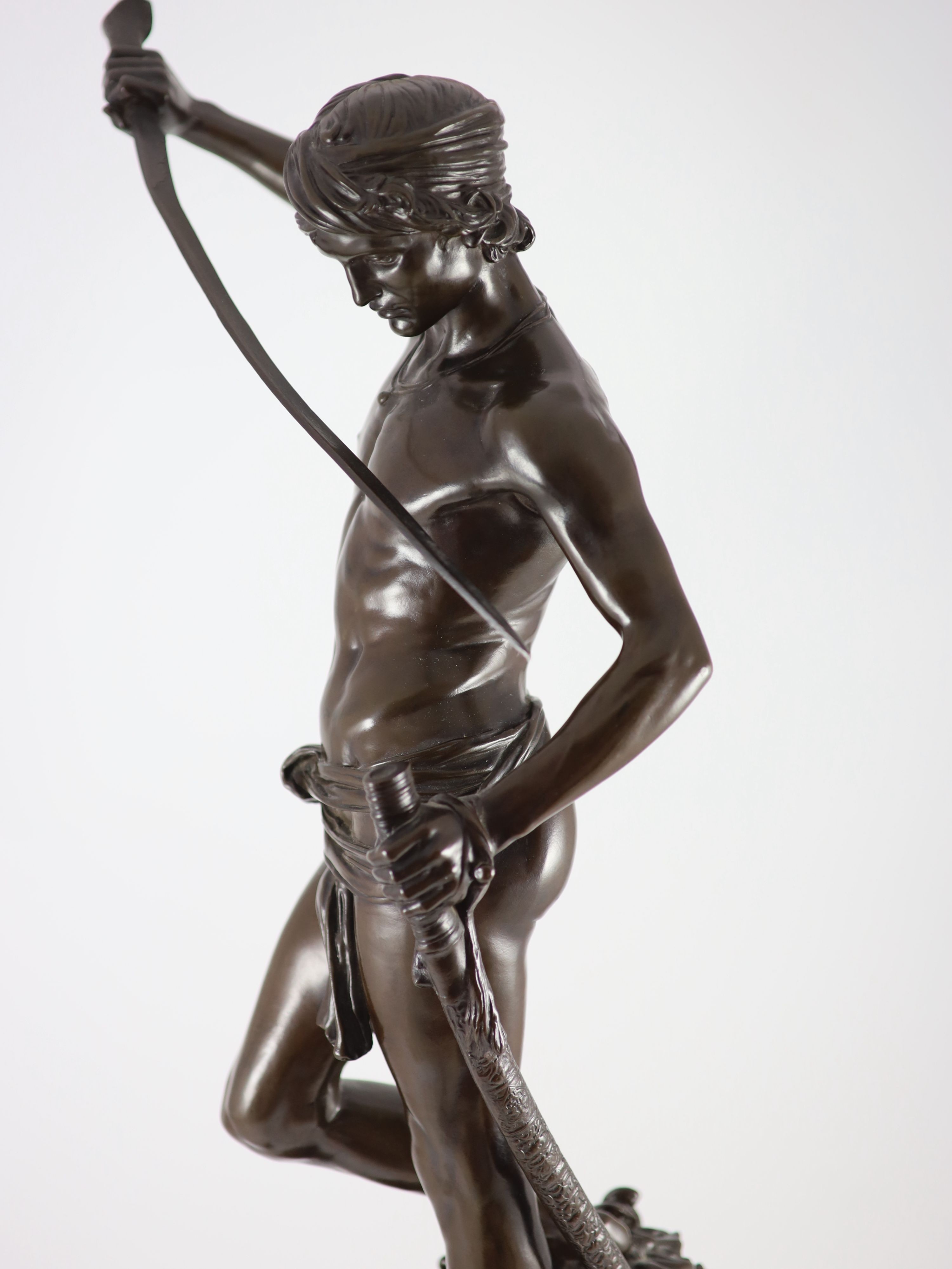 Antonin Mercié (1845-1916). A bronze figure of David standing holding a sword height 86.5cm